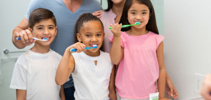 Happy family dental checkup for cavity prevention at Jireh Dental Group.